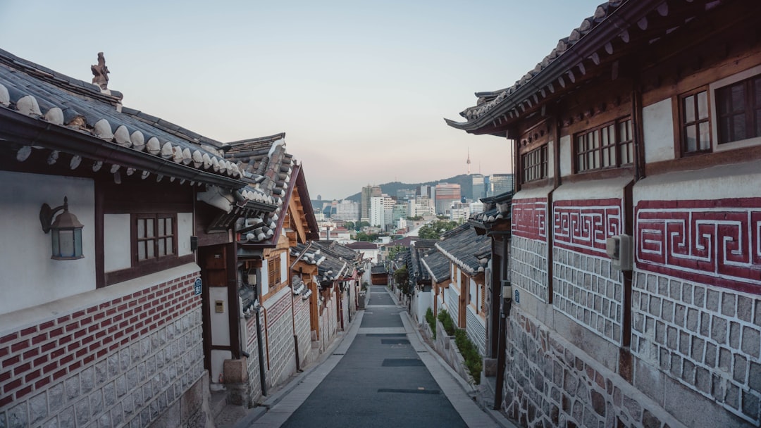 Traditional Korean hanok village in Bukchon with tiled rooftops and narrow alleys