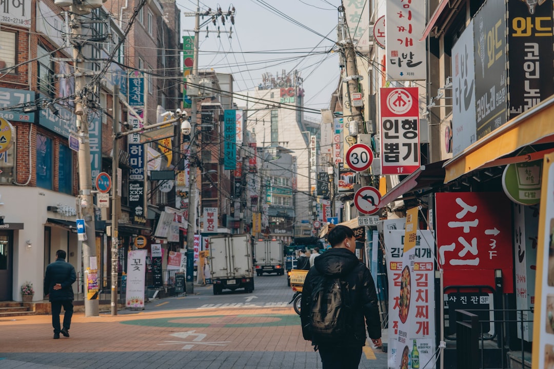 Smart traveler with map and budget notes in Seoul